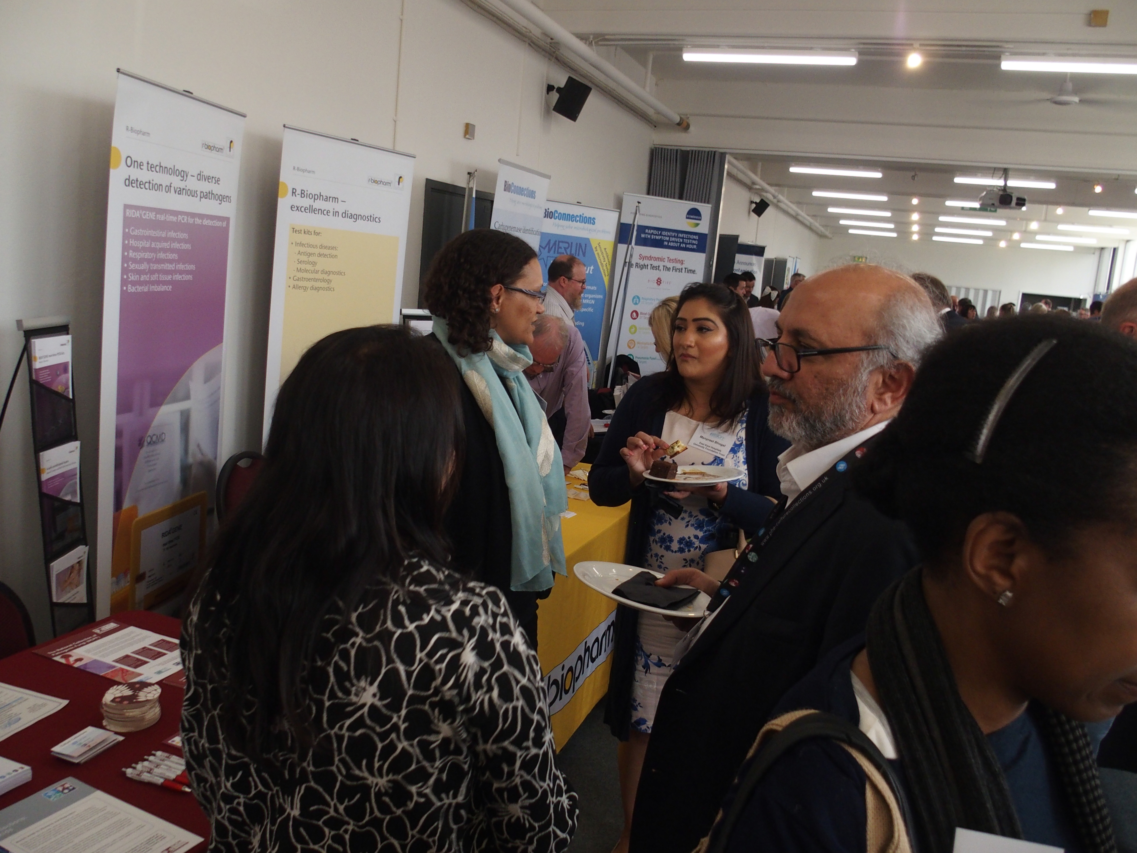 Dr Rohinton Mulla chats with other delegates in the Trade show at the 2019 ASC in the RAF Museum